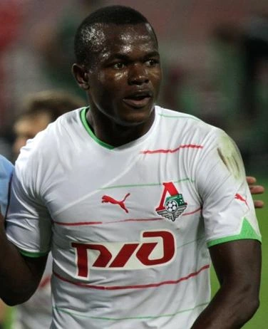 Victor Obinna in a white football jersey during a match